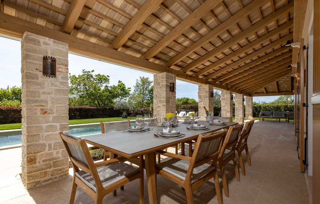 Stone villa terrace prepared for relaxed outdoor dining
